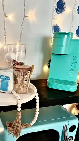 a view of hall way with furniture