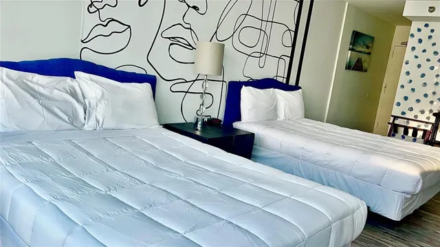 a bedroom with furniture and a bed