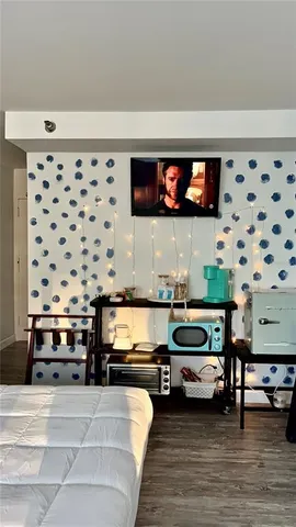 a bedroom with a bed and a walk in closet