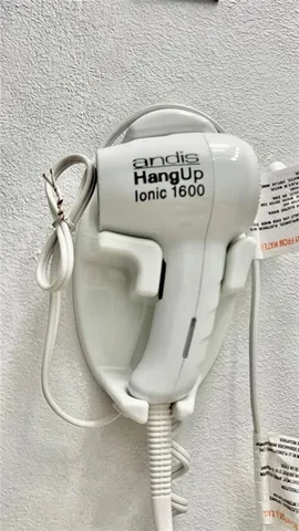 a view of empty room with wooden floor and floor to ceiling window