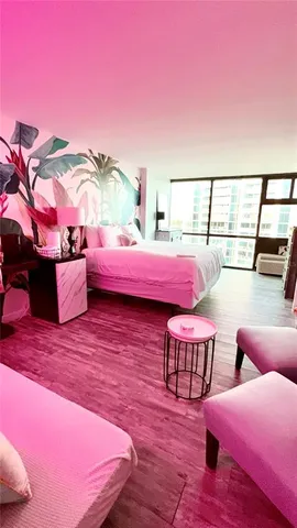 a view of living room with furniture and a window