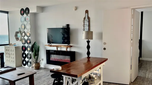 a table room with furniture and a lamp