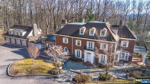 a front view of a house with yard