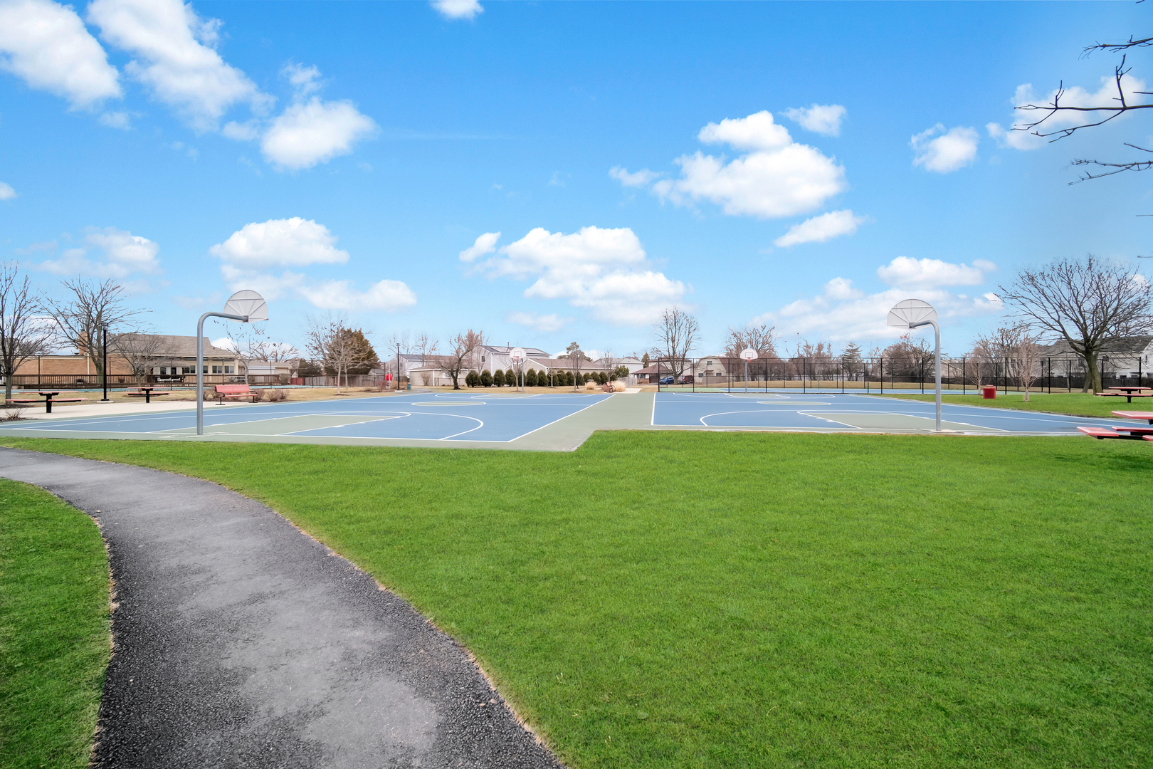 761 Colorado Court Carol Stream, IL 60188 - Photo 26 of 27 a view of a golf course with a lake