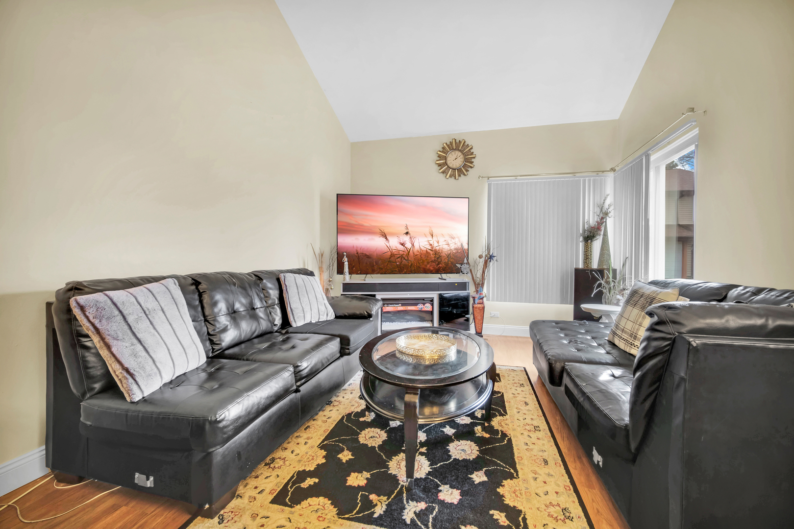 761 Colorado Court Carol Stream, IL 60188 - Photo 5 of 27 a living room with furniture and a flat screen tv