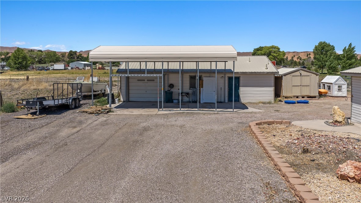 750 Leming Avenue Overton, NV 89040 - Photo 64 of 82 This property features ample outdoor space with versatile structures, perfect for various needs.