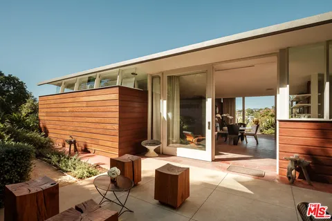 a front view of a building with seating space