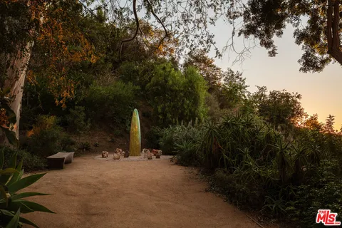 a view of a street with a trees