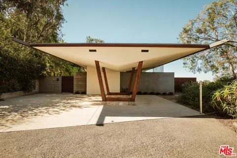 a view of an entrance gate of a house