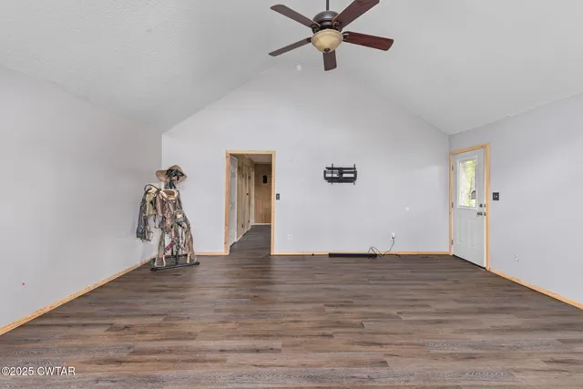 a bathroom with a sink mirror and toilet