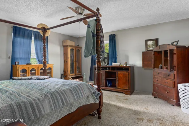 a view of a workspace with furniture and toys