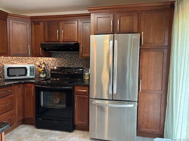 100 Crans Road Middletown, NY 10941 - Photo 3 of 24 a kitchen with stainless steel appliances granite countertop a refrigerator and a stove top oven