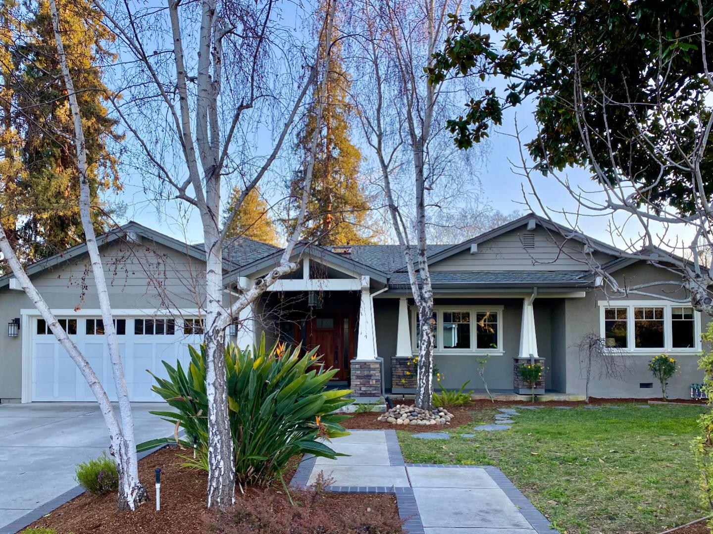 718 Covington Road Los Altos, CA 94024 - Photo 1 of 49 a front view of a house with garden