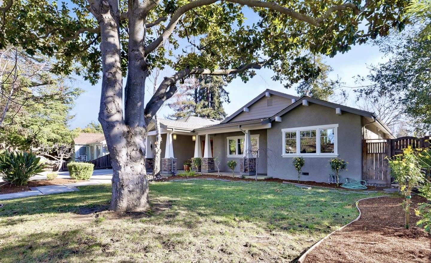 718 Covington Road Los Altos, CA 94024 - Photo 2 of 49 a front view of house with yard and green space