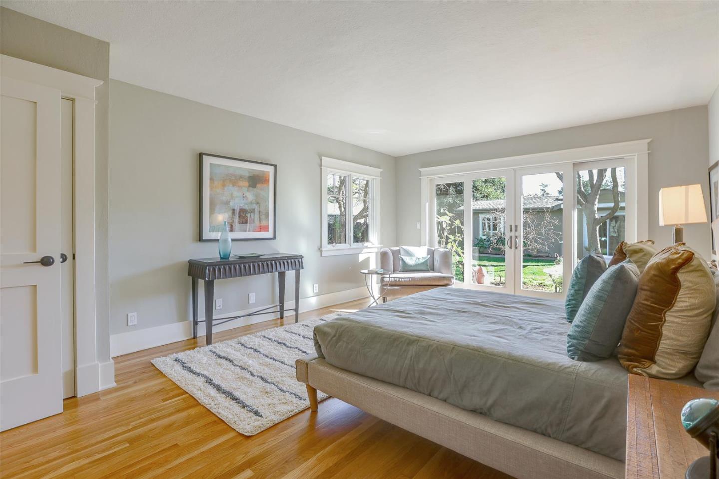 718 Covington Road Los Altos, CA 94024 - Photo 24 of 49 a living room with a bed furniture and next to a window
