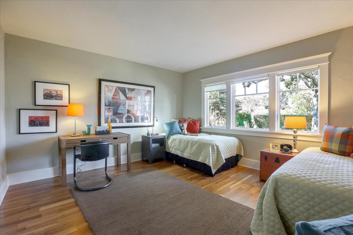 718 Covington Road Los Altos, CA 94024 - Photo 26 of 49 a spacious bedroom with two beds and a table