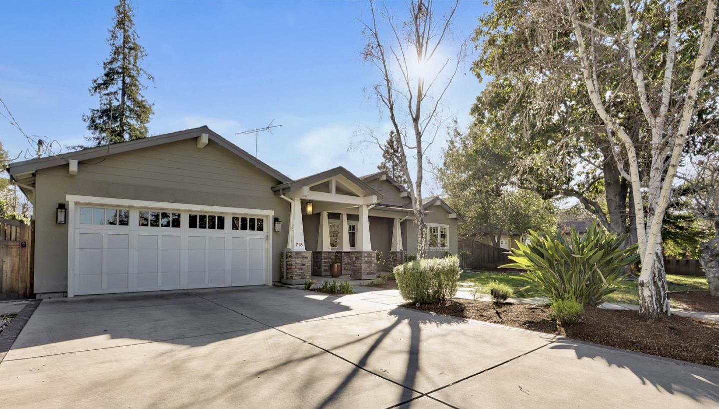 718 Covington Road Los Altos, CA 94024 - Photo 3 of 49 a front view of a house with a yard and potted plants