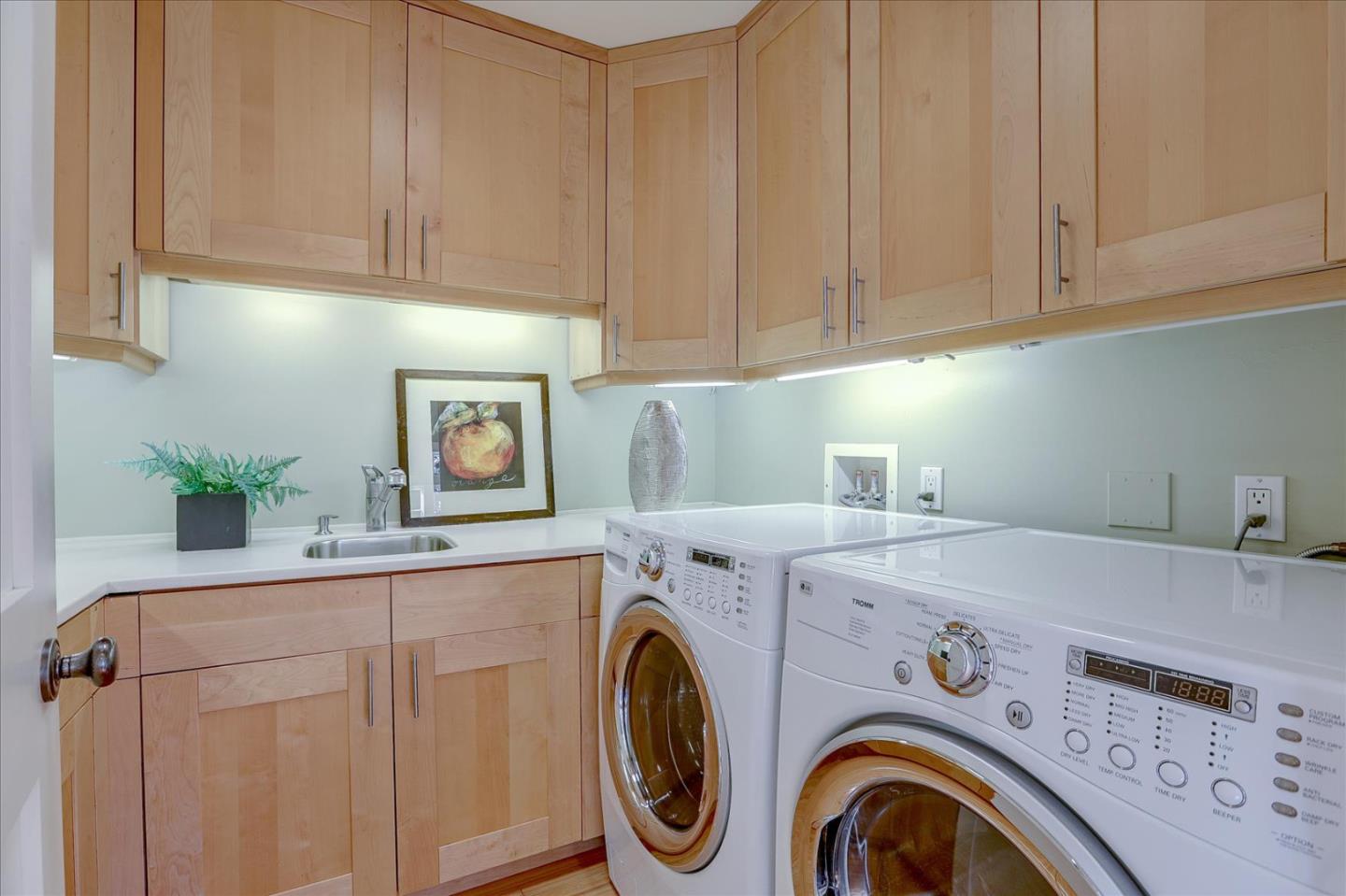 718 Covington Road Los Altos, CA 94024 - Photo 33 of 49 a utility room with dryer and washer