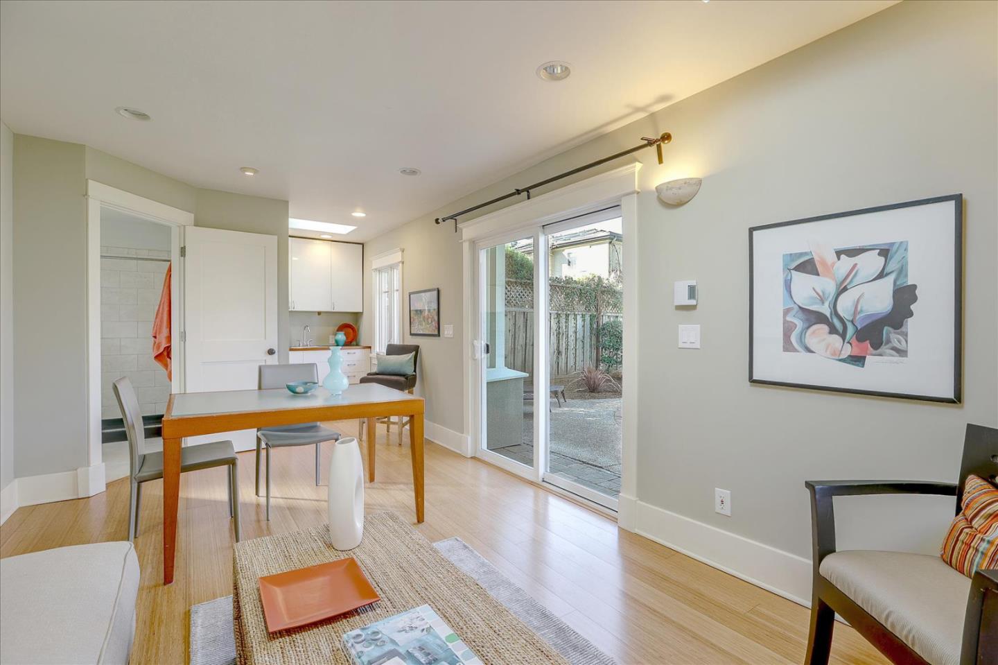 718 Covington Road Los Altos, CA 94024 - Photo 34 of 49 a living room with furniture a rug and a large window