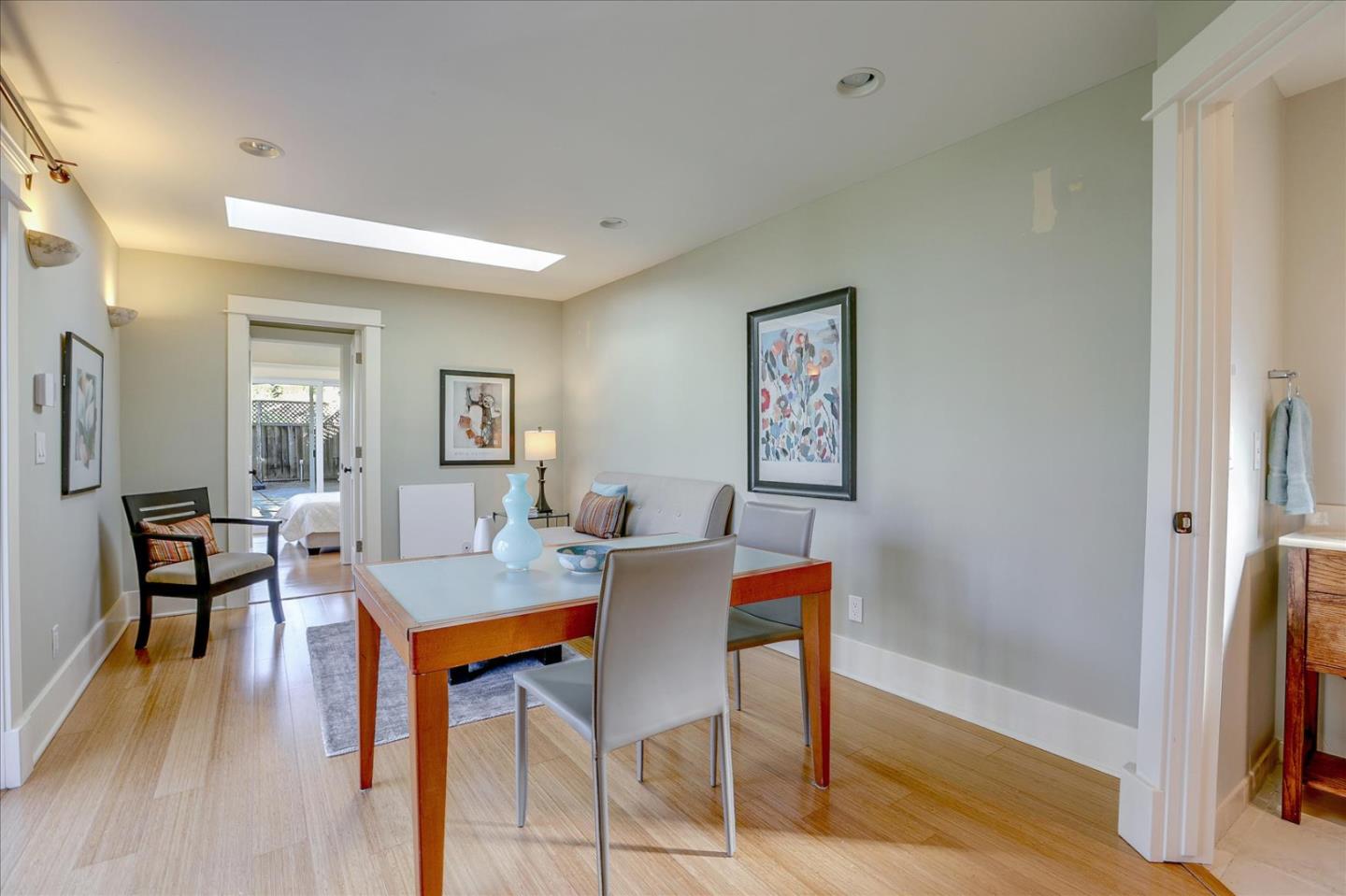 718 Covington Road Los Altos, CA 94024 - Photo 35 of 49 a view of a dining room with furniture and wooden floor