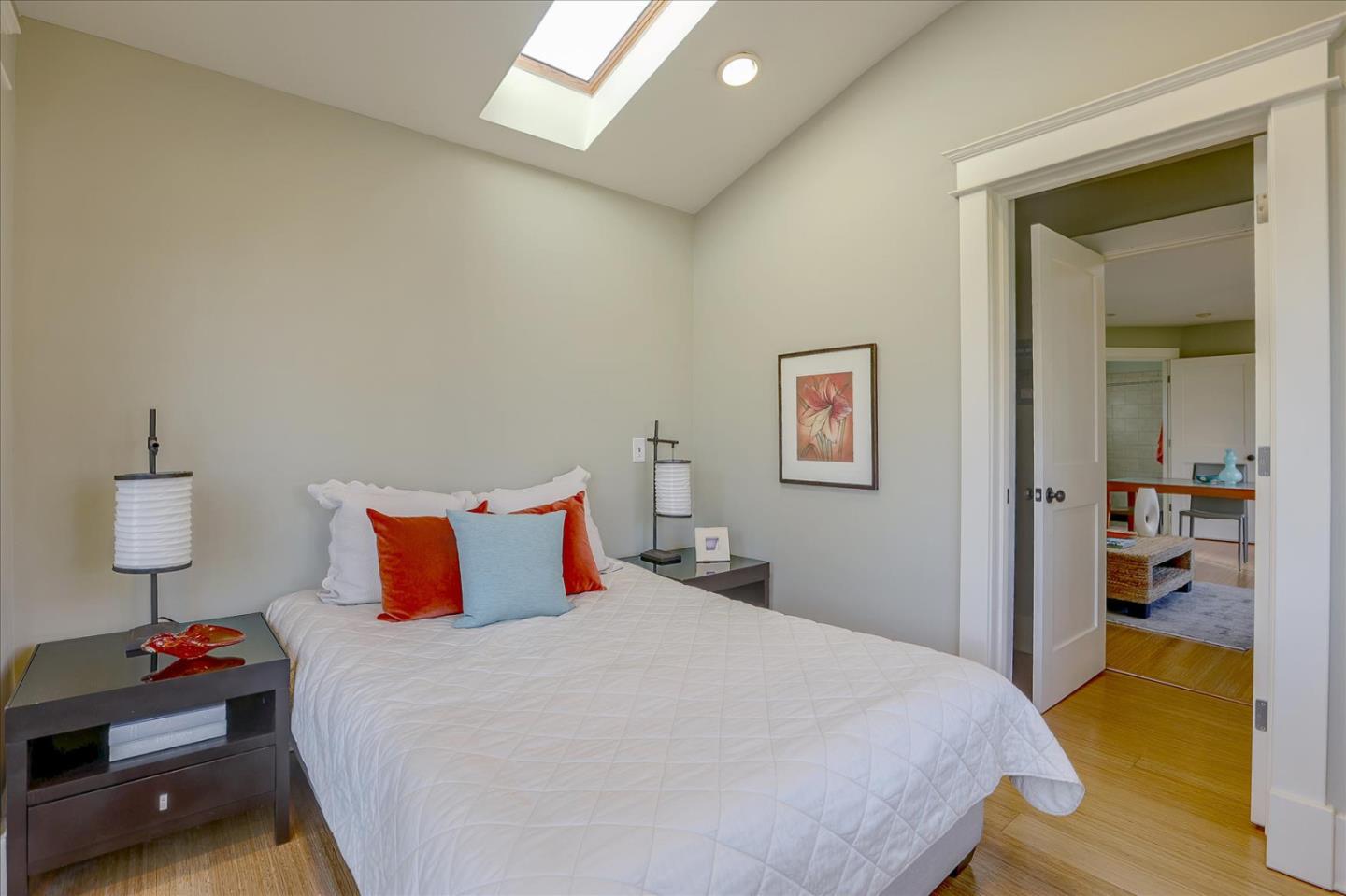 718 Covington Road Los Altos, CA 94024 - Photo 39 of 49 a bedroom with a bed and a lamp on table
