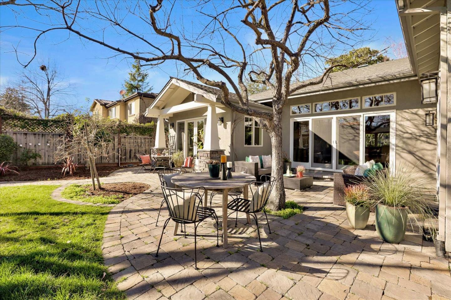 718 Covington Road Los Altos, CA 94024 - Photo 43 of 49 a view of a patio with couches table and chairs and potted plants