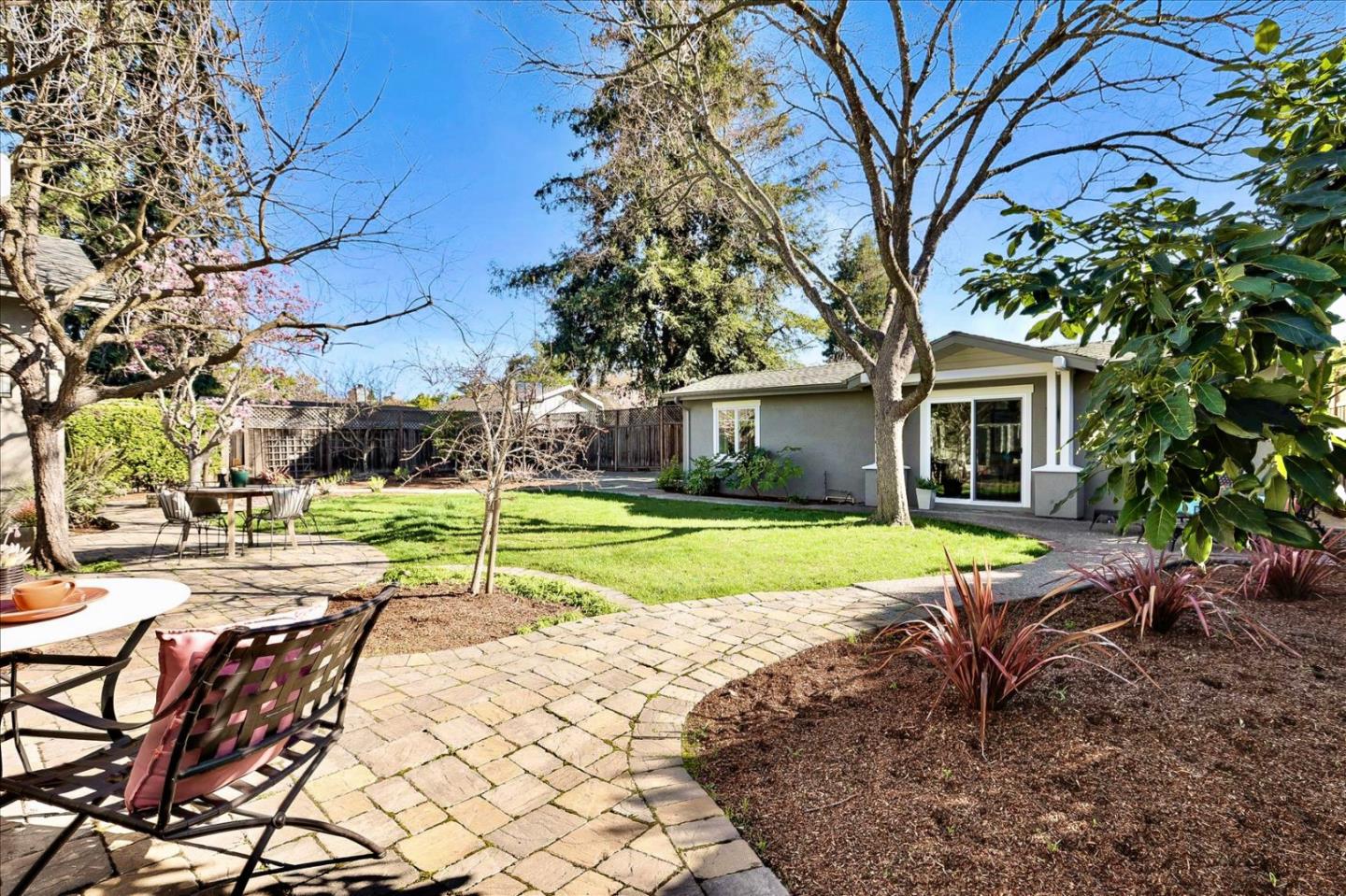 718 Covington Road Los Altos, CA 94024 - Photo 46 of 49 a view of a house with backyard and sitting area