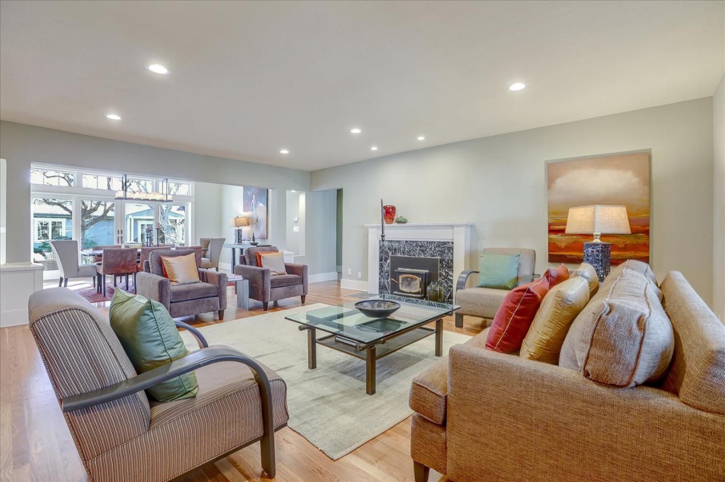 718 Covington Road Los Altos, CA 94024 - Photo 7 of 49 a living room with furniture and a fireplace