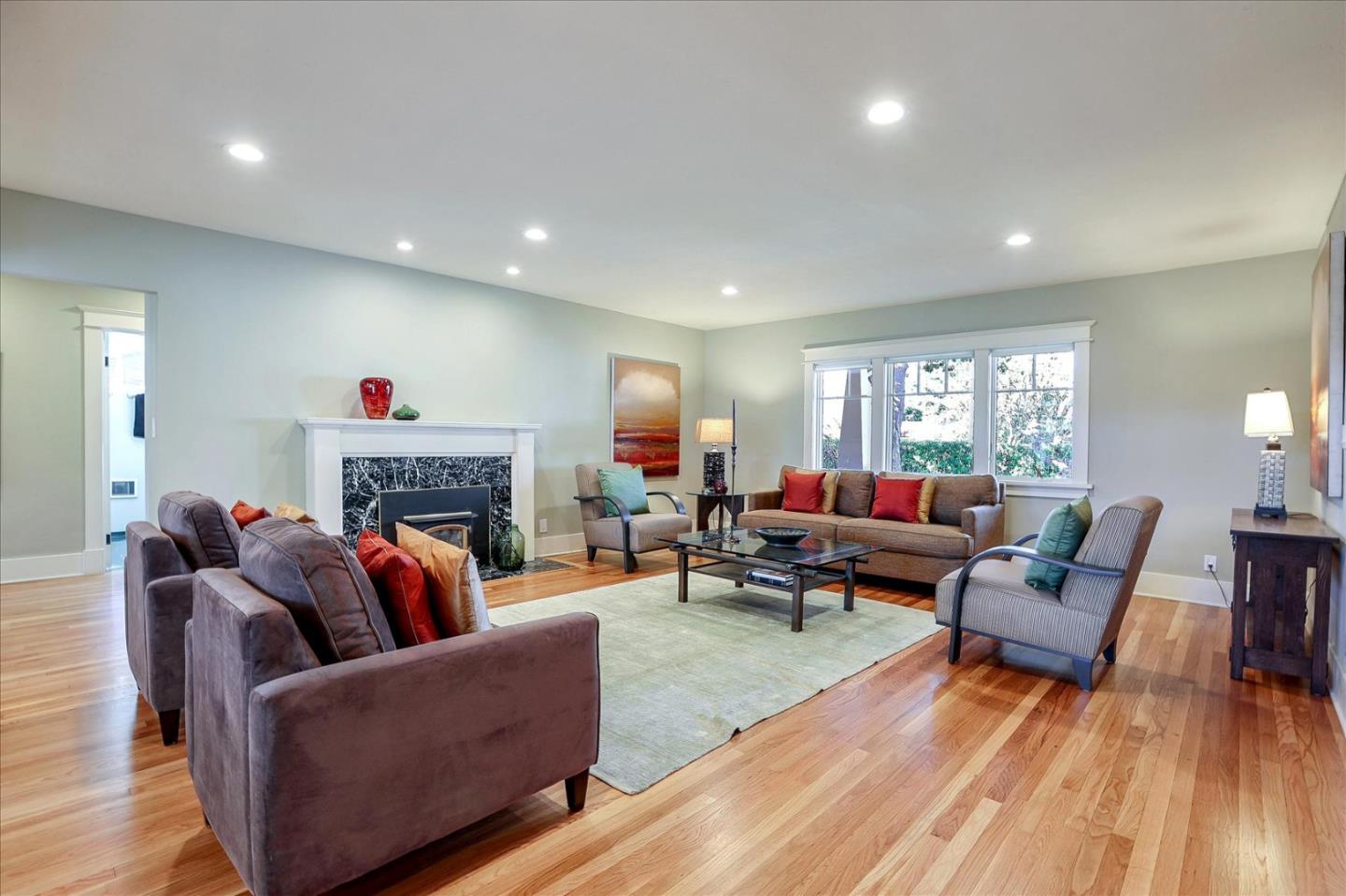 718 Covington Road Los Altos, CA 94024 - Photo 9 of 49 a living room with furniture and a fireplace