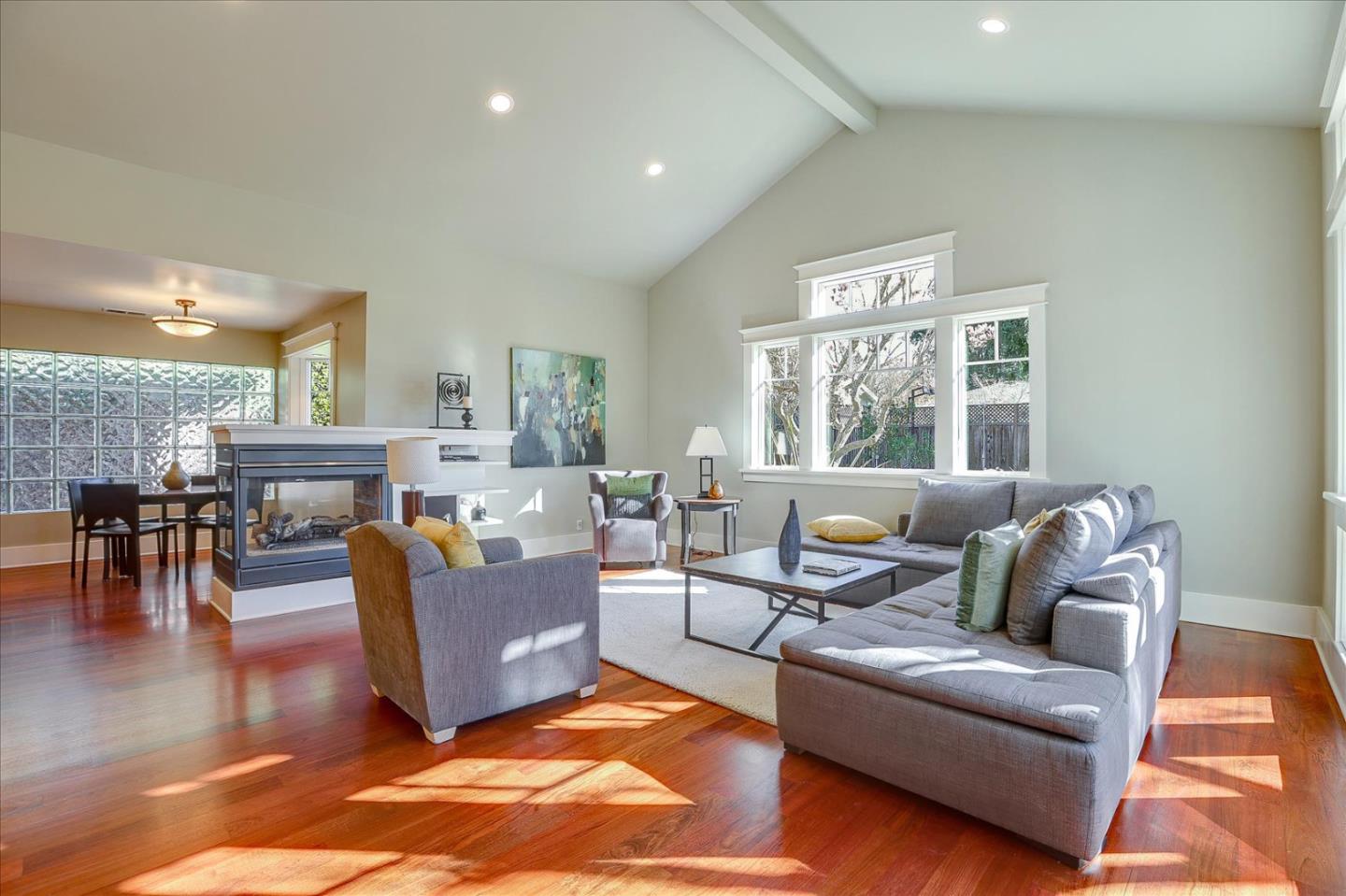 718 Covington Road Los Altos, CA 94024 - Photo 10 of 49 a living room with fireplace furniture and a large window