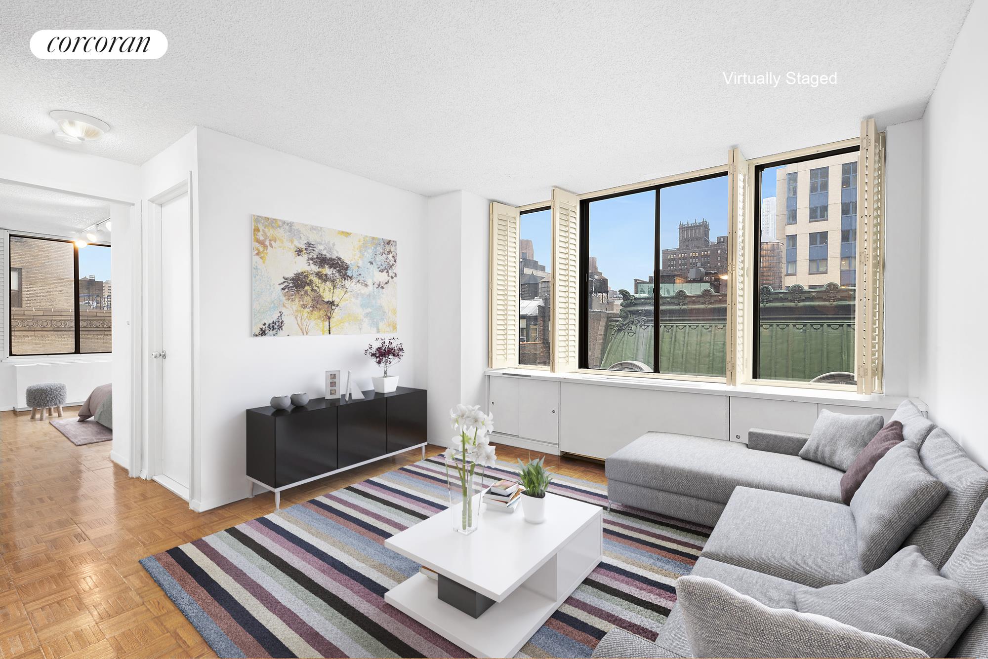 445 5th Avenue, Unit 16F Manhattan, NY 10016 - Photo 1 of 8 a living room with furniture and a large window