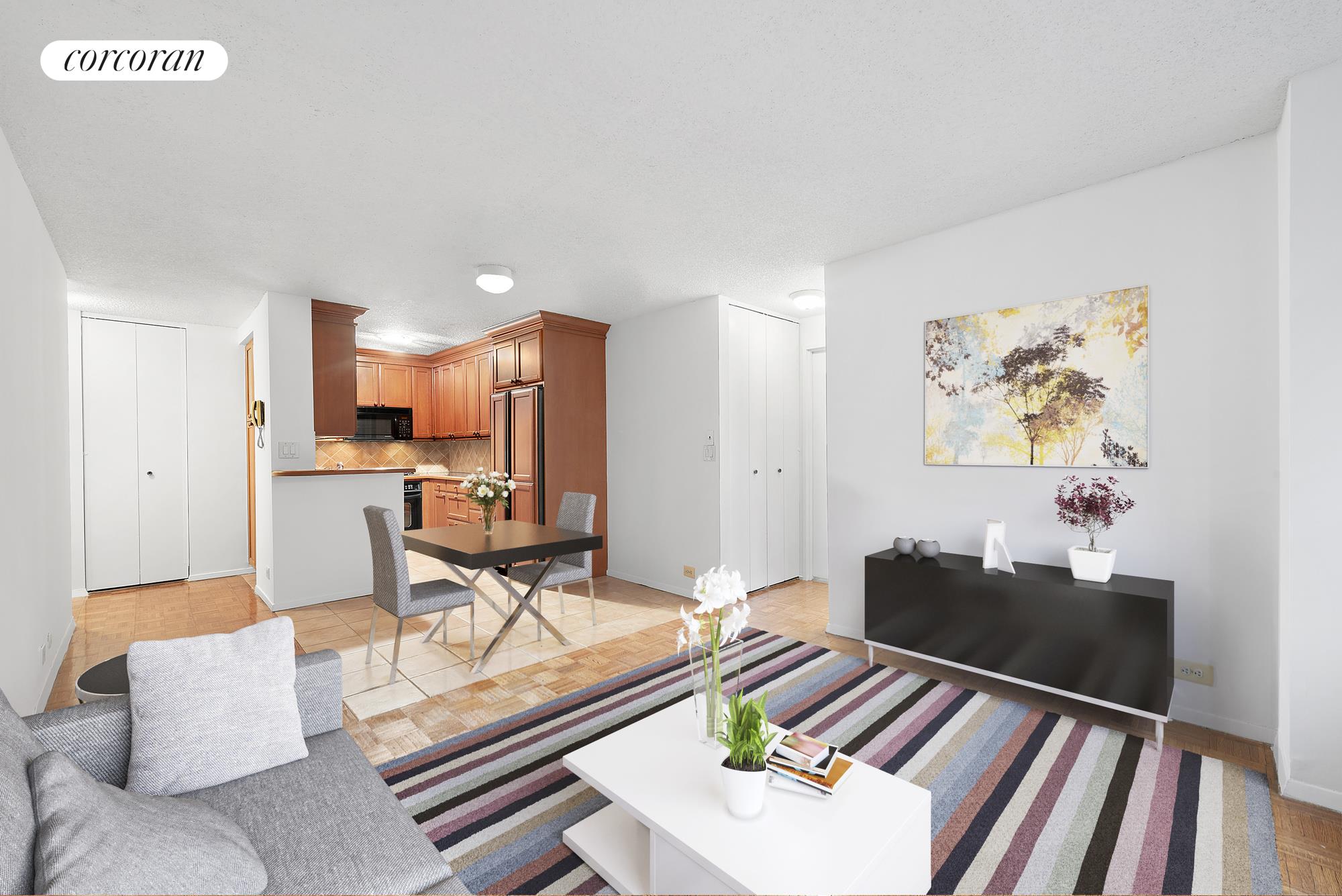 445 5th Avenue, Unit 16F Manhattan, NY 10016 - Photo 2 of 8 a living room with kitchen and furniture