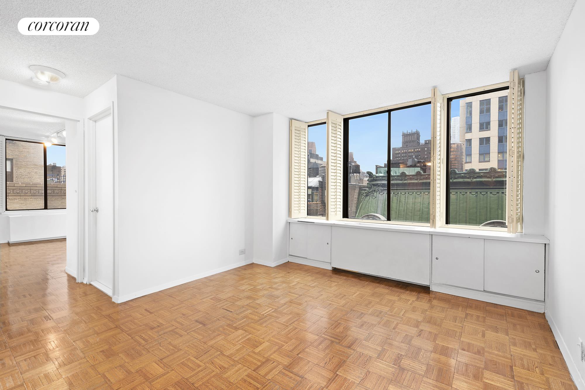 445 5th Avenue, Unit 16F Manhattan, NY 10016 - Photo 6 of 8 a view of an empty room with a window