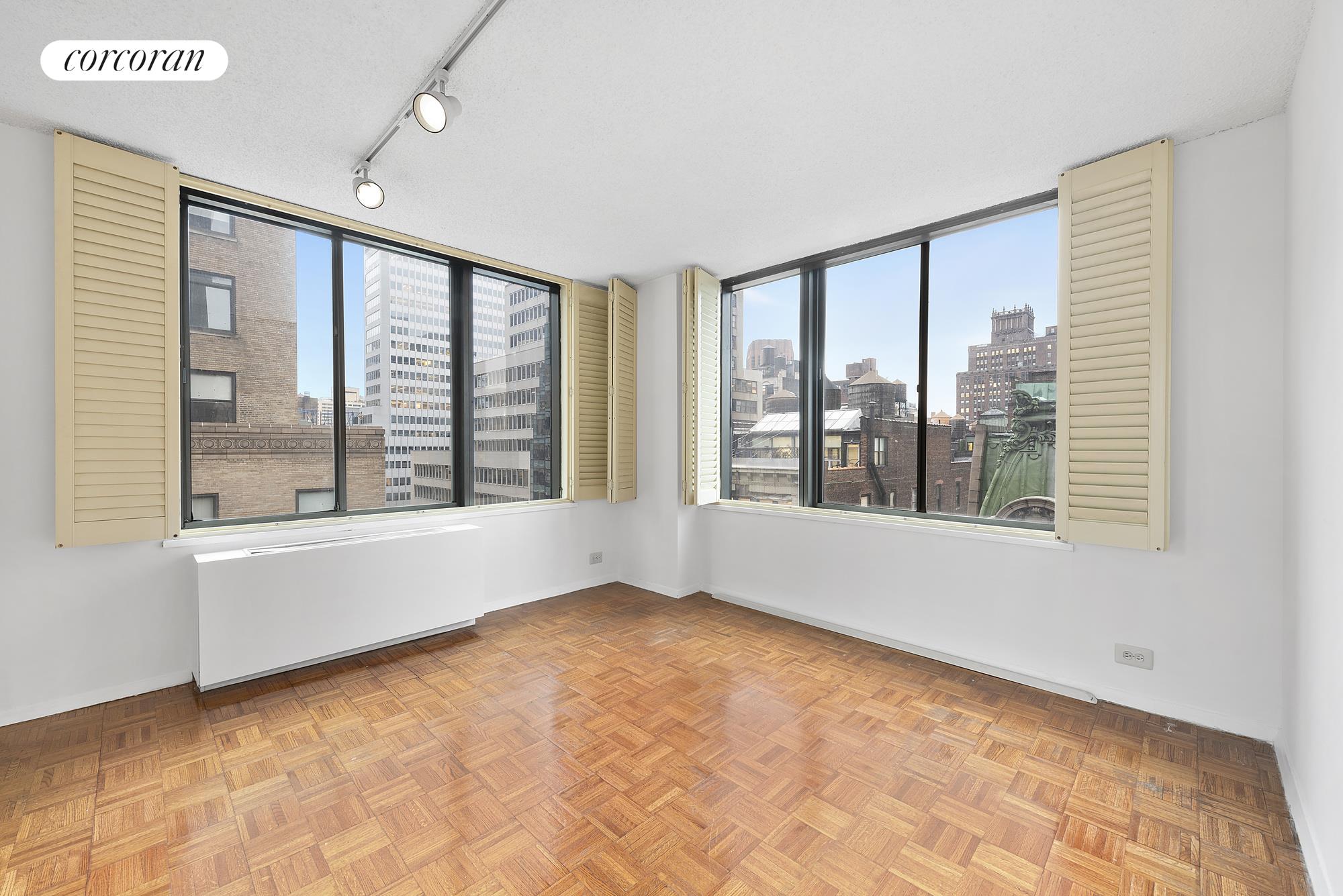 445 5th Avenue, Unit 16F Manhattan, NY 10016 - Photo 7 of 8 a view of an empty room with a window