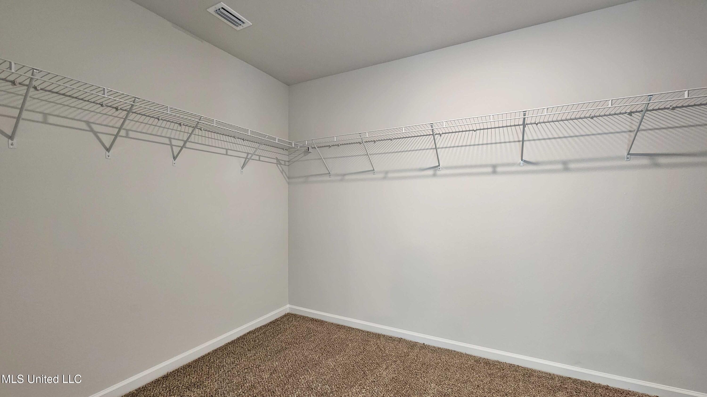 13401 Pond Ridge Way Gulfport, MS 39503 - Photo 20 of 27 19_Primarycloset