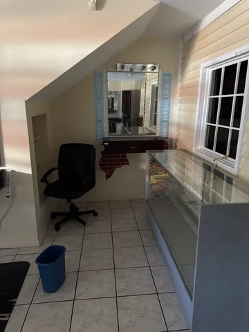 a bathroom with a toilet and a sink