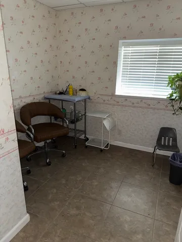 a bathroom with a toilet and a sink