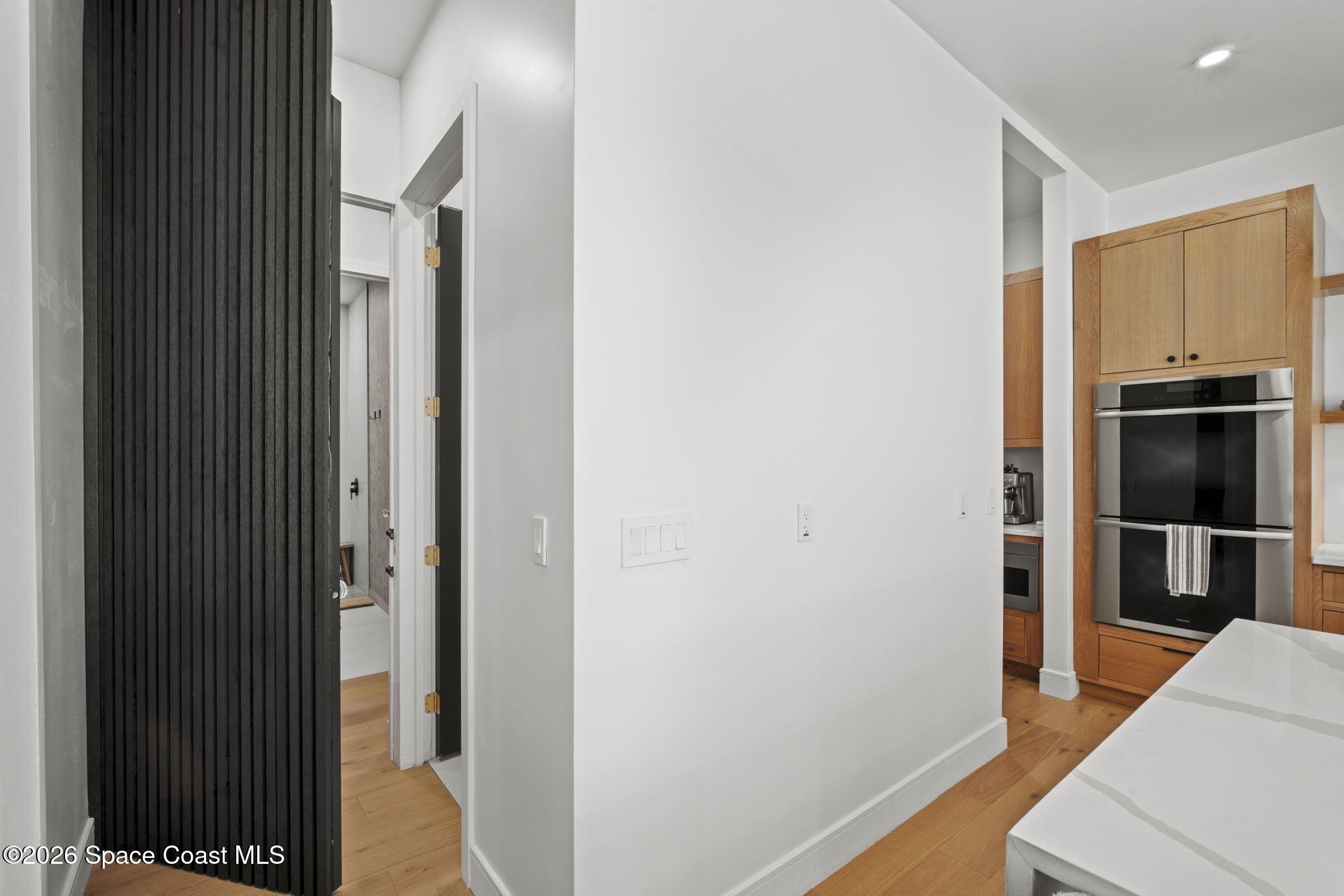 785 Seymour Road Northeast Palm Bay, FL 32905 - Photo 33 of 67 a view of hallway with wooden floor