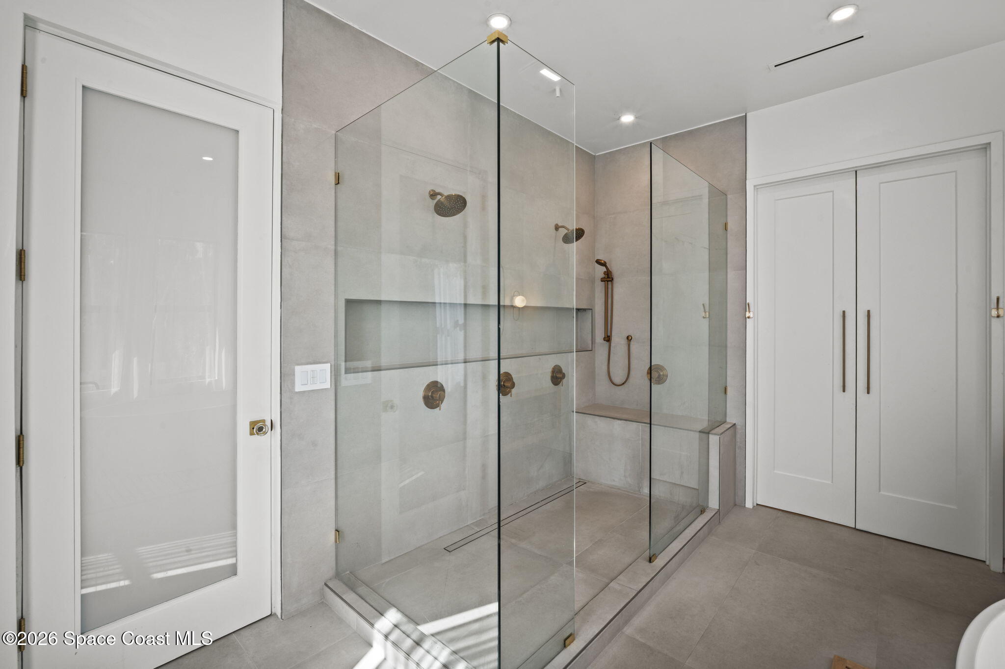785 Seymour Road Northeast Palm Bay, FL 32905 - Photo 52 of 67 a bathroom with a shower and a sink
