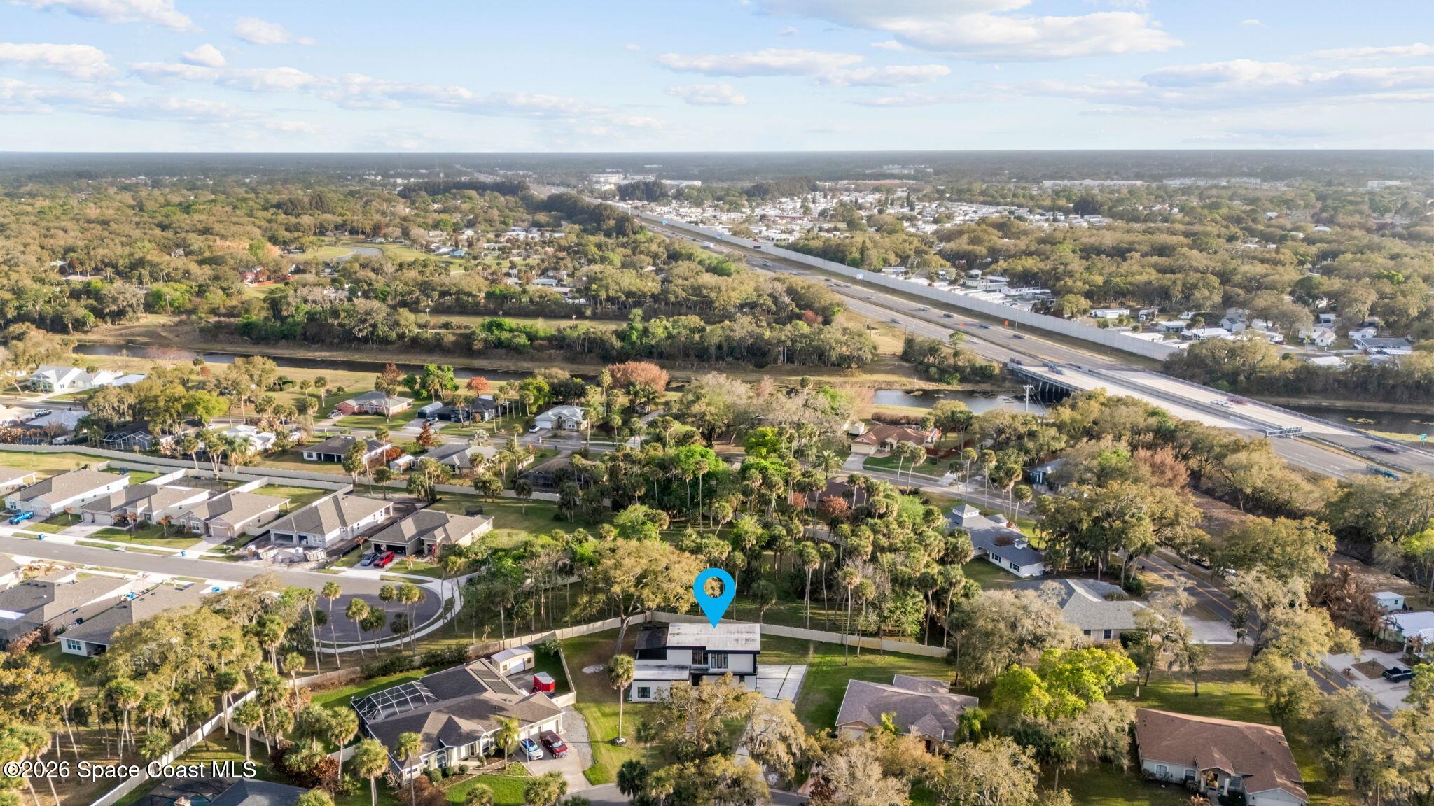 785 Seymour Road Northeast Palm Bay, FL 32905 - Photo 66 of 67 an aerial view of multiple house