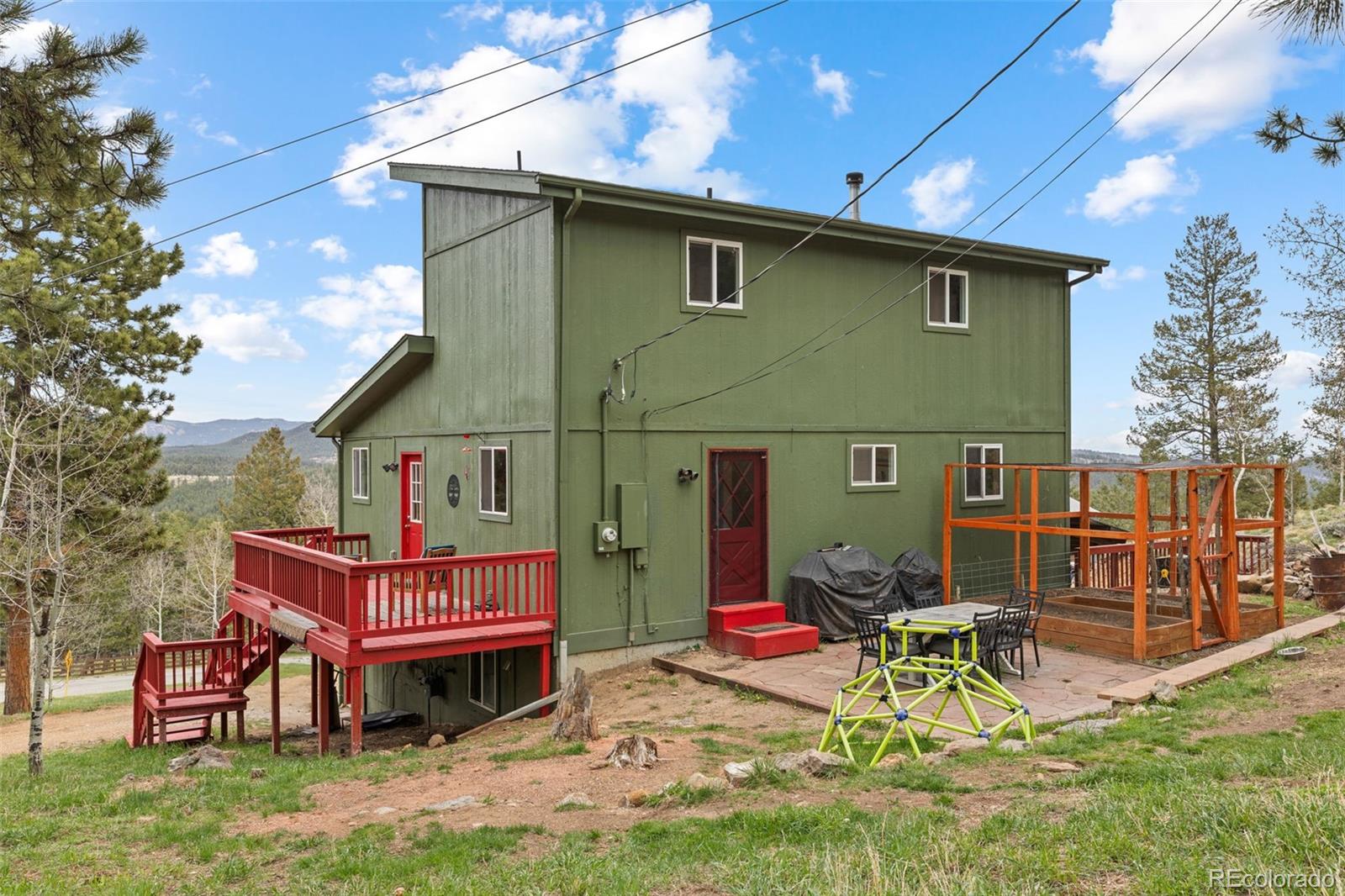 518 Pine Drive Bailey, CO 80421 - Photo 38 of 43 a house view with a sitting space