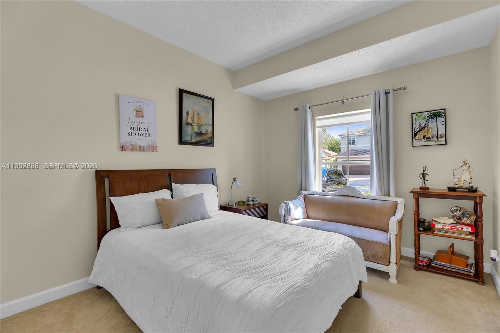 4441 Stone Ridge Way Weston, FL 33331 - Photo 17 of 87 a bedroom with a bed and a window