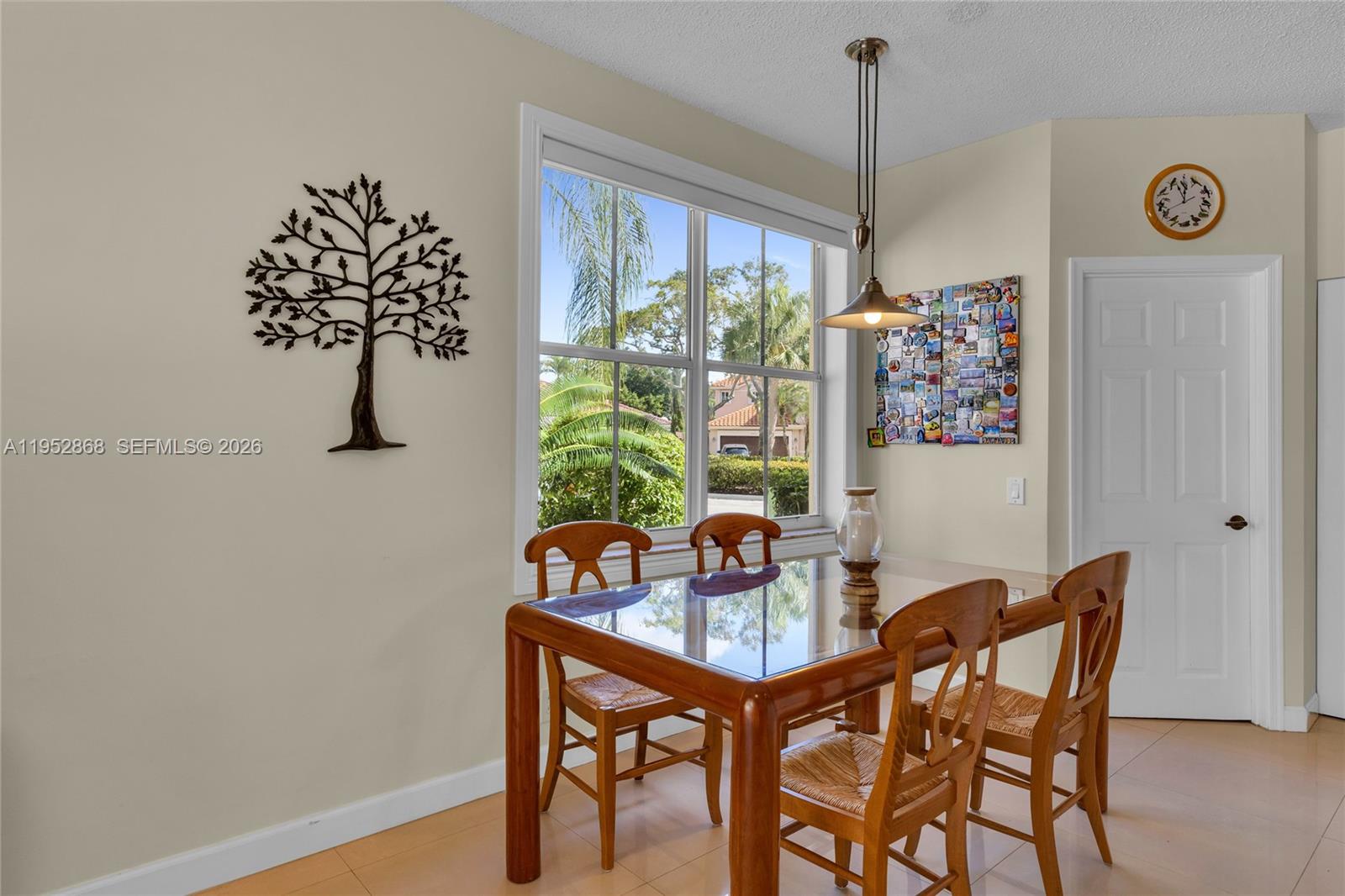 4441 Stone Ridge Way Weston, FL 33331 - Photo 22 of 87 a dining room with furniture and window