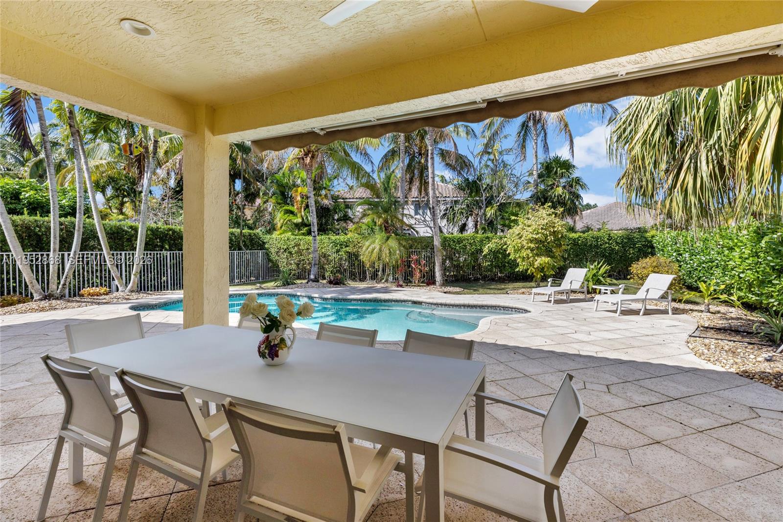 4441 Stone Ridge Way Weston, FL 33331 - Photo 30 of 87 a dining area with furniture and large windows