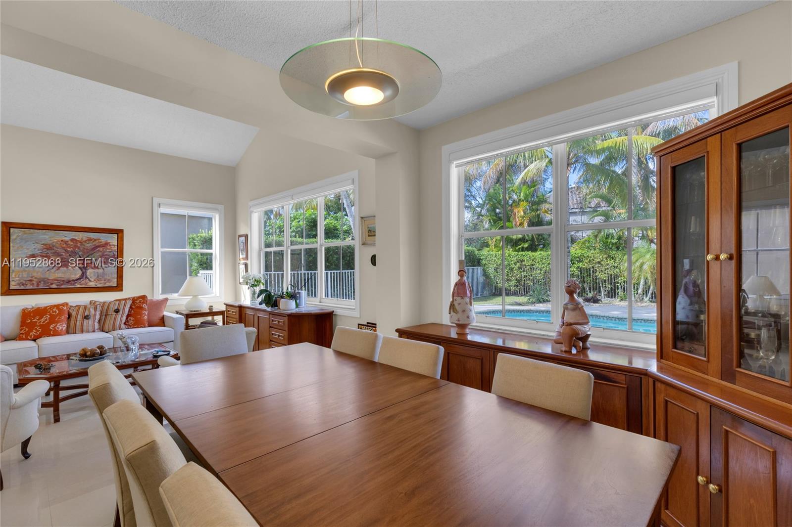 4441 Stone Ridge Way Weston, FL 33331 - Photo 5 of 87 a living room with furniture and large windows