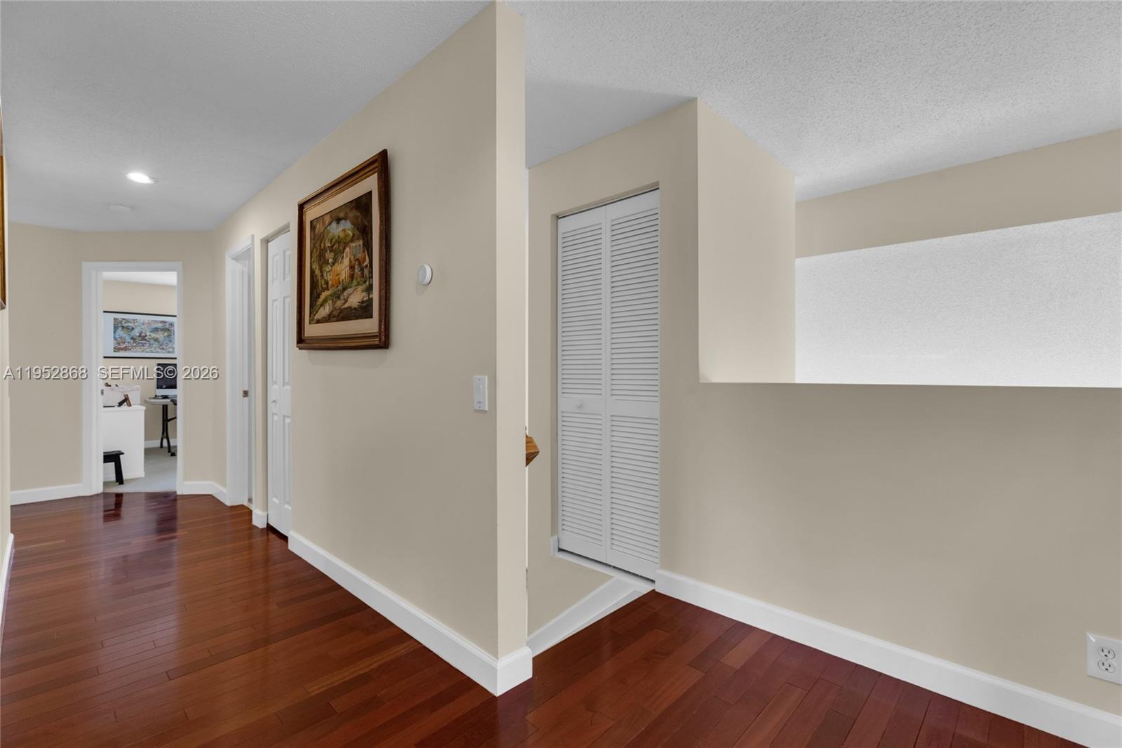 4441 Stone Ridge Way Weston, FL 33331 - Photo 51 of 87 an empty room with wooden floor and windows