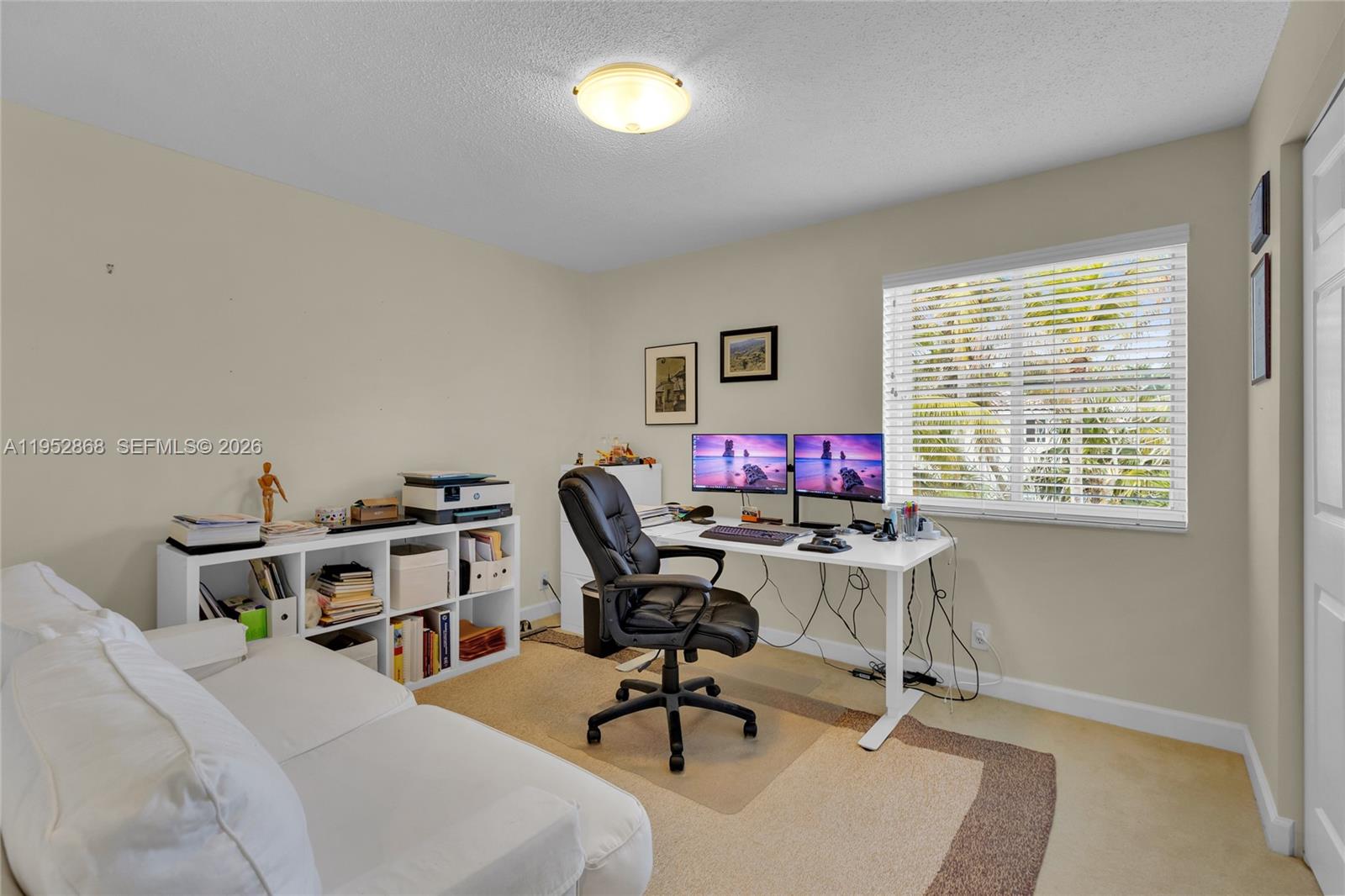 4441 Stone Ridge Way Weston, FL 33331 - Photo 53 of 87 a workspace with furniture and a window