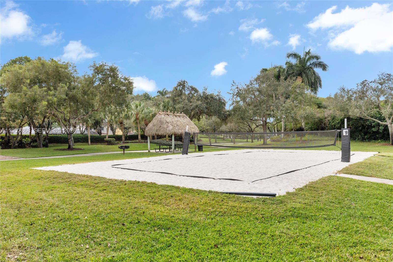 4441 Stone Ridge Way Weston, FL 33331 - Photo 69 of 87 a view of a playground with basketball court