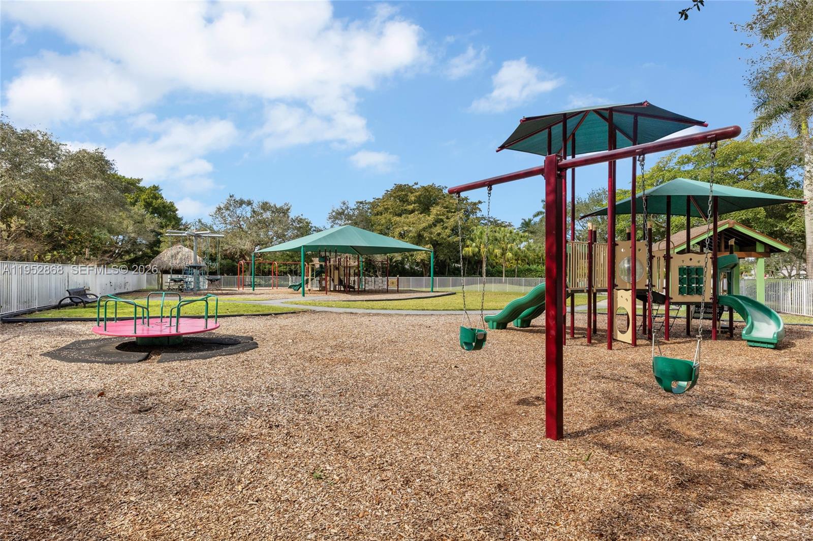 4441 Stone Ridge Way Weston, FL 33331 - Photo 73 of 87 a view of a park with slide
