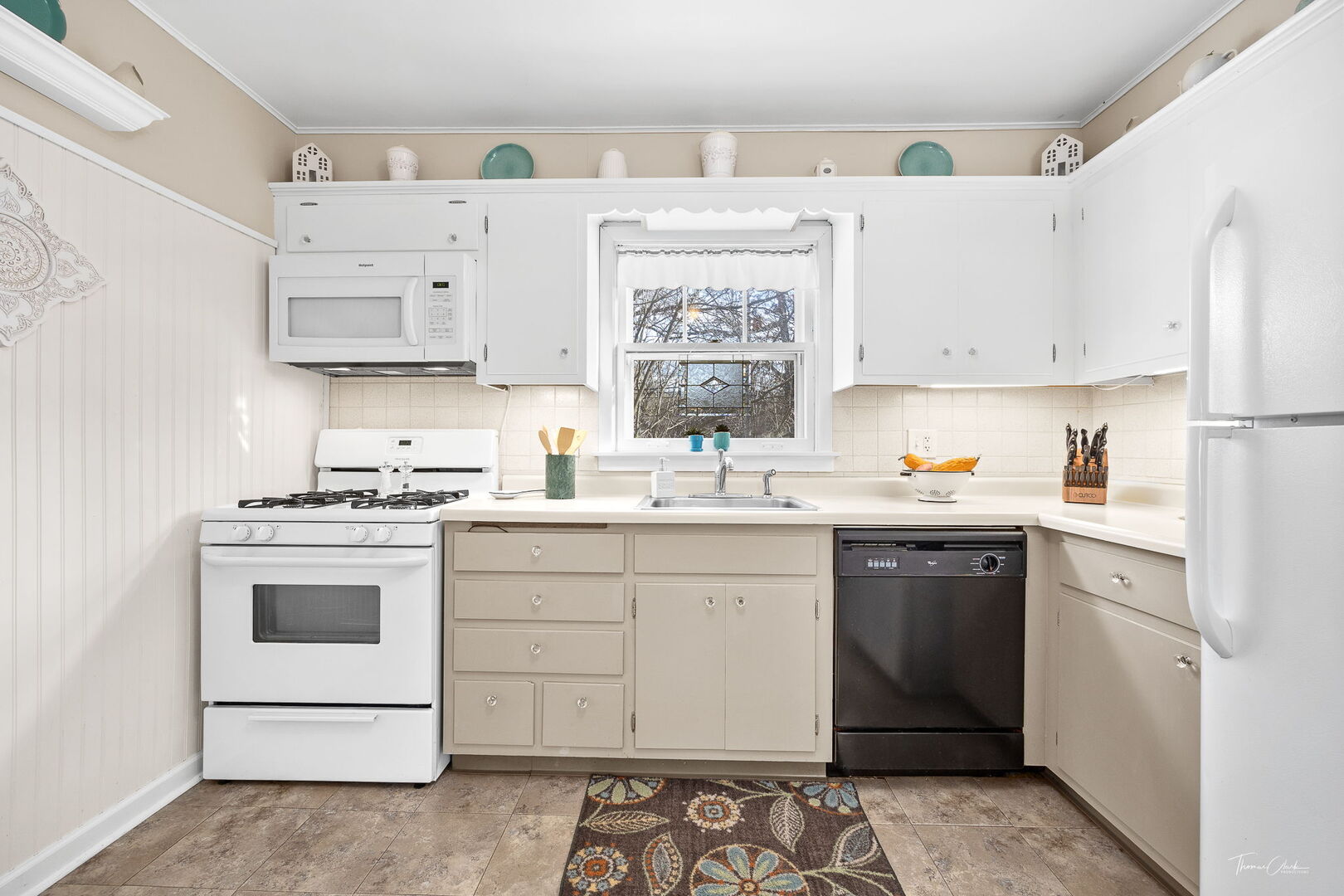 1901 Curtiss Street Downers Grove, IL 60515 - Photo 12 of 45 a kitchen with cabinets appliances and a sink